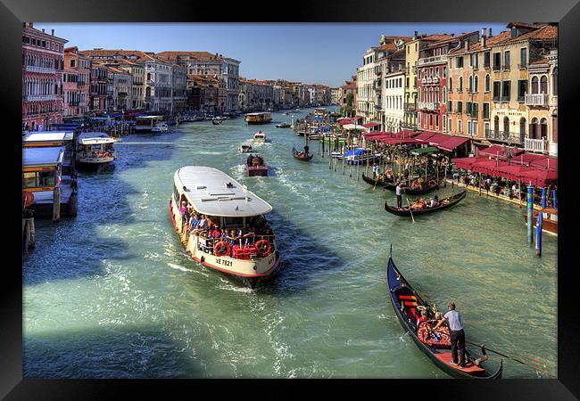Traffic on the Grand Canal Framed Print by Tom Gomez
