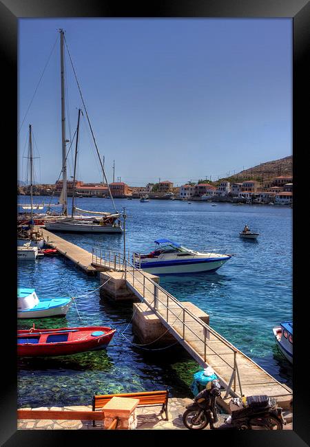 The Yacht Pier Framed Print by Tom Gomez