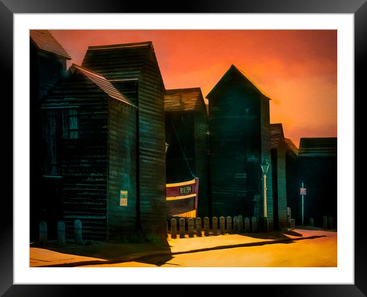 Fishing Huts On Hastings Seafront at Sunset Framed Mounted Print by Chris Lord