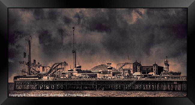 Another Blustery Day On The Pier Framed Print by Chris Lord