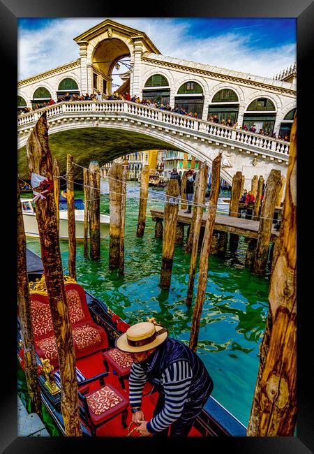 The Rialto Bridge On The Grand Canal In Venice Framed Print by Chris Lord