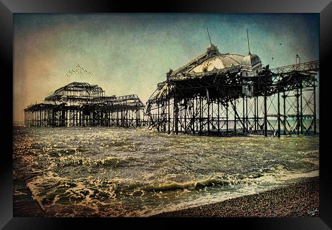 Ruins of the Old West Pier Framed Print by Chris Lord