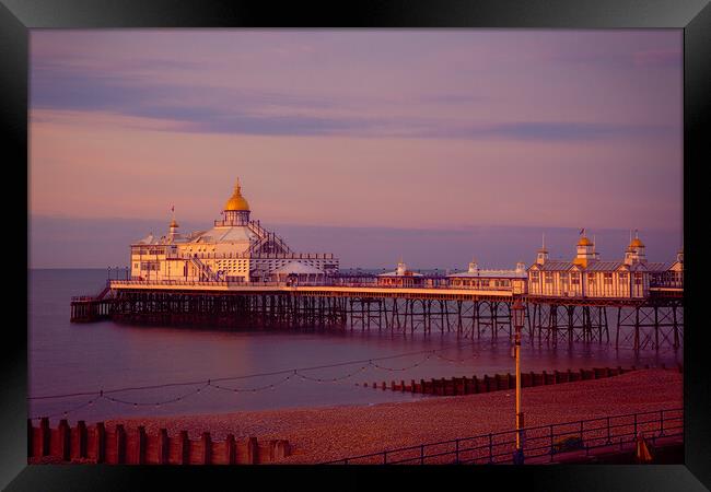 Daybreak At The Eastbourne Pier Framed Print by Chris Lord