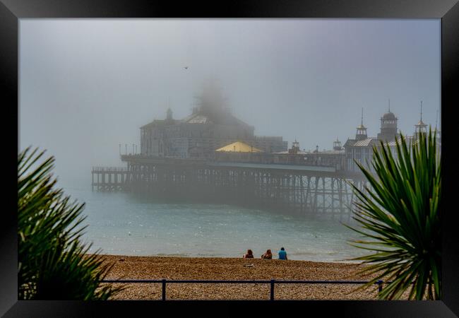 Misty Morning At Eastbourne Pier Framed Print by Chris Lord