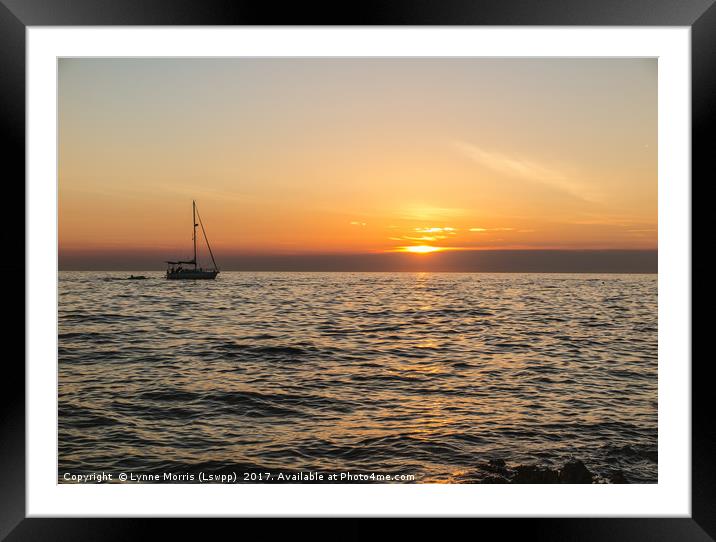 Boat at Sunset Framed Mounted Print by Lynne Morris (Lswpp)