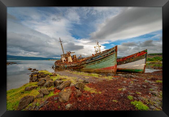 fishing boat wrecks Scotland Framed Print by Eddie John