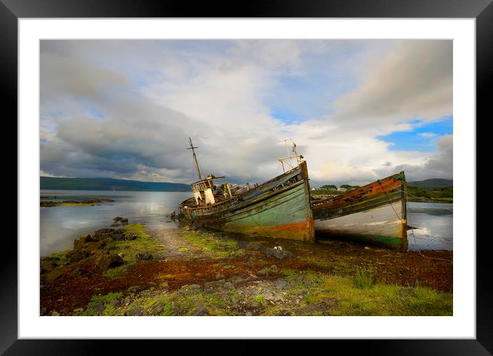 Fishing boats  abandoned Isle of Mull Framed Mounted Print by Eddie John