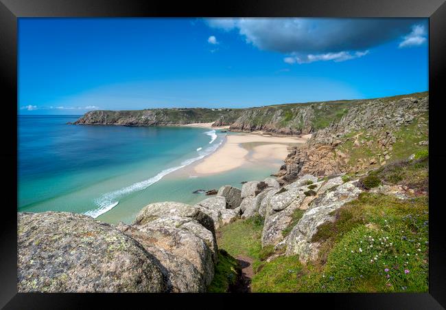 Porthcurno beach and treen cliffs Framed Print by Eddie John