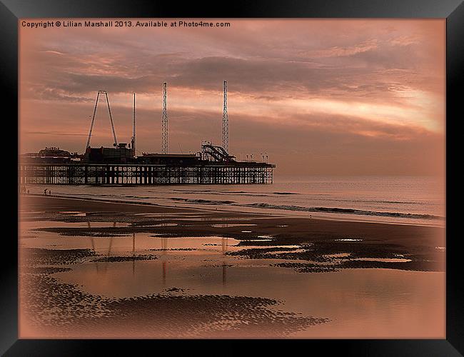 South Pier at Sunset Framed Print by Lilian Marshall