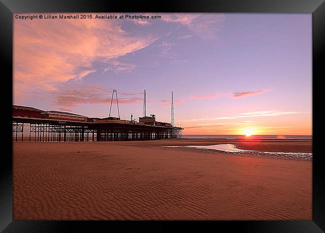  Sunset over South Pier.  Framed Print by Lilian Marshall