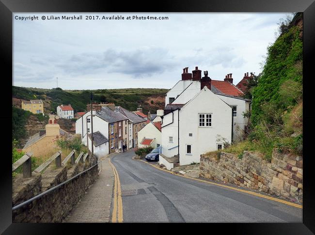 Down to the village of Staithes Framed Print by Lilian Marshall