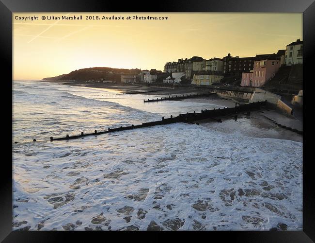 Sunrise over Cromer Promenade. Framed Print by Lilian Marshall