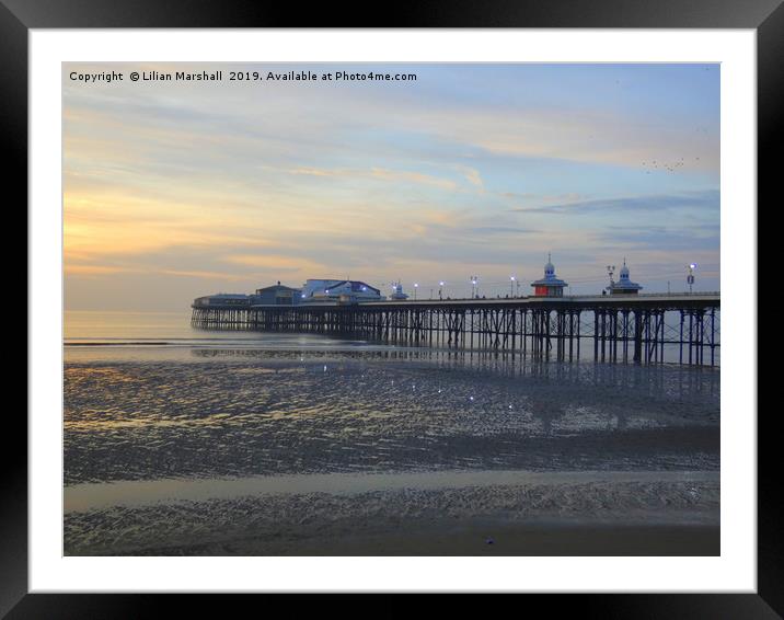 Sunset over North Pier. Blackpool in Lancashire.  Framed Mounted Print by Lilian Marshall