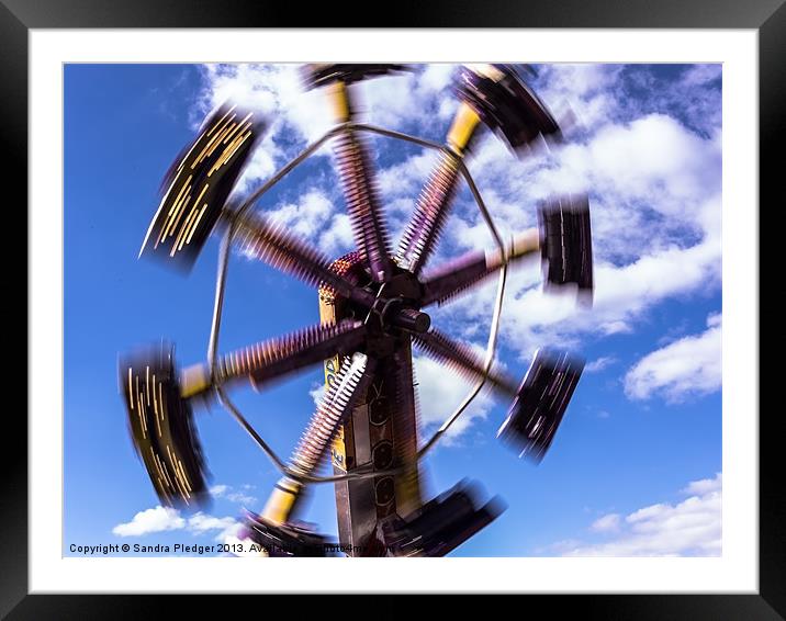 All in a spin Framed Mounted Print by Sandra Pledger