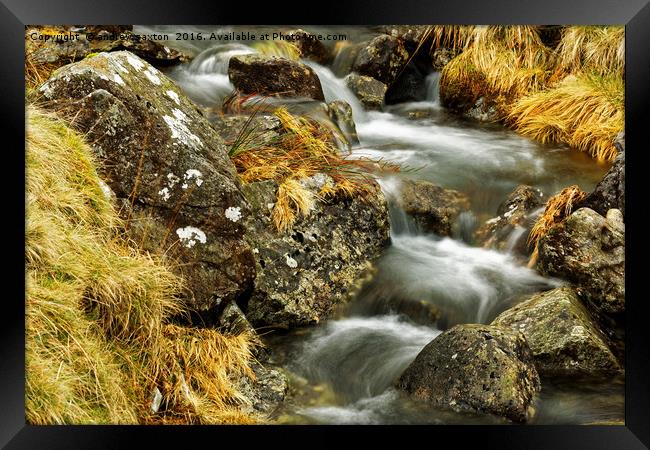 ROCKS WITH WATER Framed Print by andrew saxton