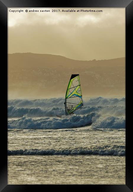 FIGHTING THE WAVES Framed Print by andrew saxton