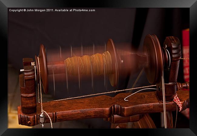 Spinning a yarn. Framed Print by John Morgan