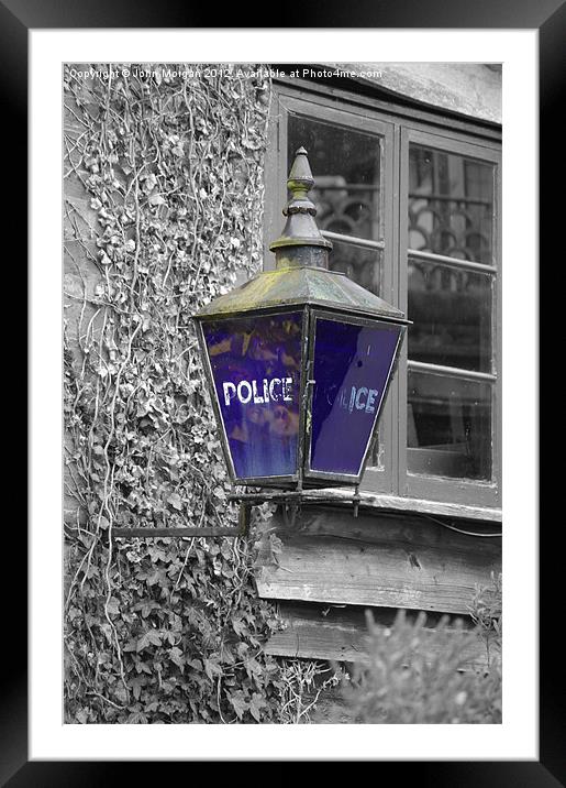 Police blue light. Framed Mounted Print by John Morgan