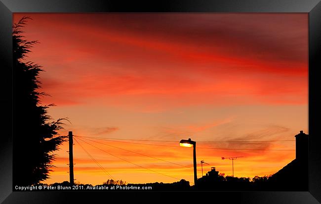 Red & Orange Urban Sky @ Dusk Framed Print by Peter Blunn