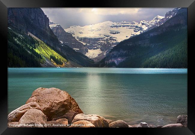 Rockey Mountain Lake Framed Print by Peter Blunn