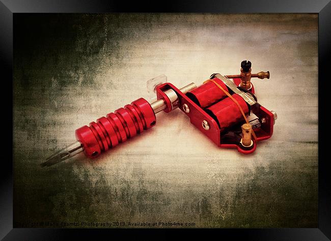 Red tattoo gun Framed Print by Maria Tzamtzi Photography