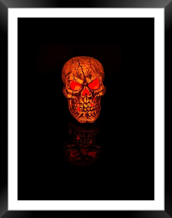 Glowing Halloween Skull Reflecting Evil Framed Mounted Print by Steve Purnell