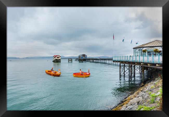Little Rowers At Mumbles Pier Framed Print by Steve Purnell