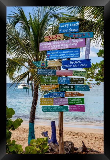 Sign Post on Bequia Framed Print by Roger Green