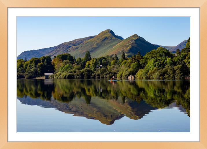 Paddling the Lakes Framed Mounted Print by Roger Green