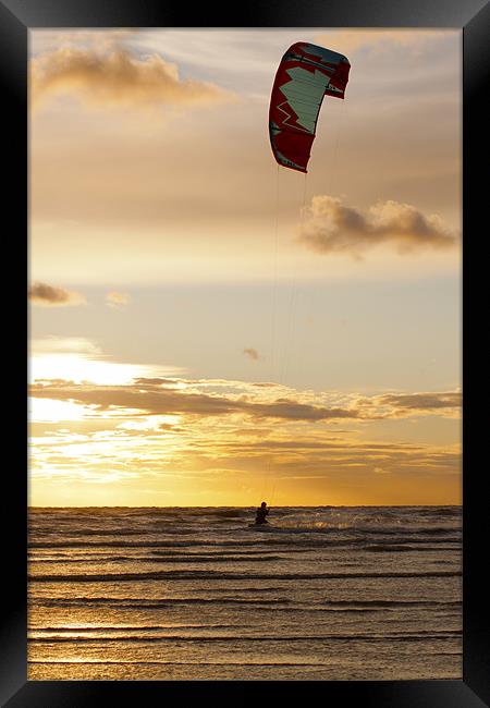 Kitesurfing to the Sun Framed Print by Roger Green