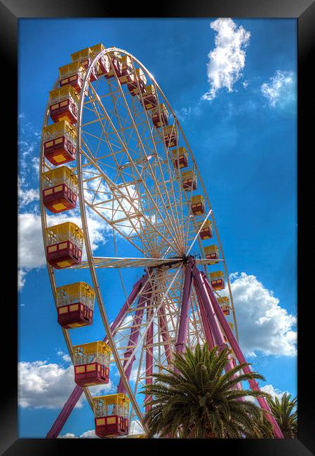 The Big Wheel Framed Print by Roger Green