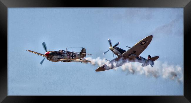 Spitfire versus the ME109 Framed Print by Roger Green