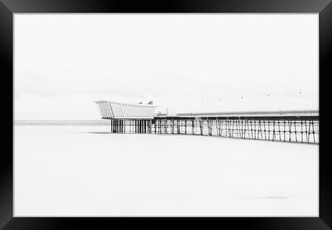 Southport Pier in the Snow Framed Print by Roger Green