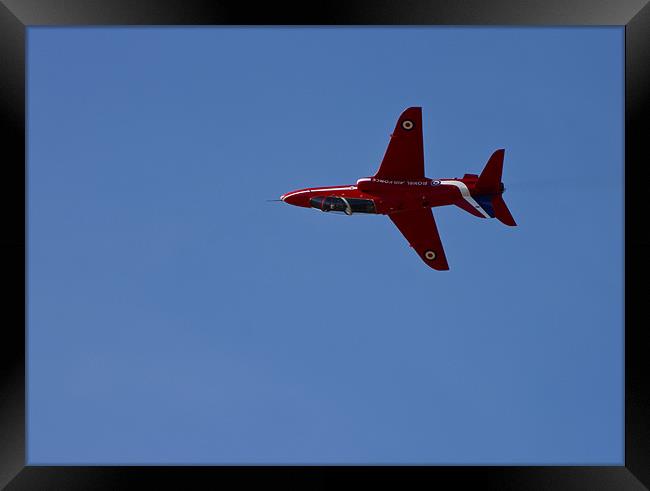 Red Arrow Framed Print by Roger Green