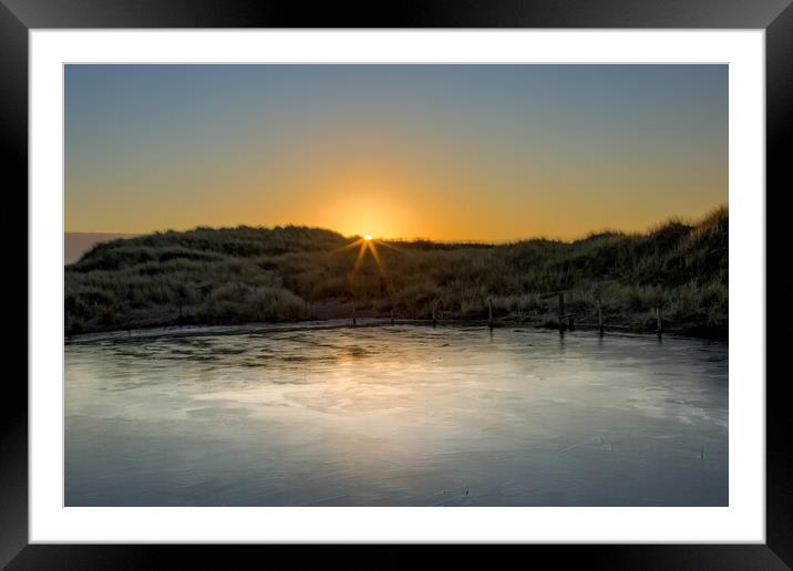 Frozen Pond in the Ainsdale Sand Dunes Framed Mounted Print by Roger Green