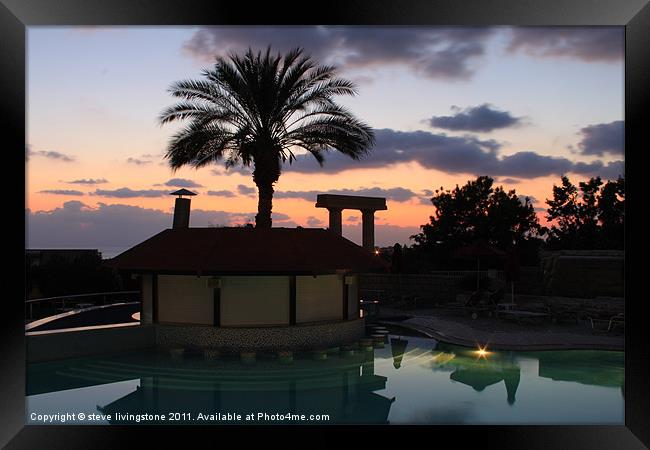 the holiday pool bar at night Framed Print by steve livingstone