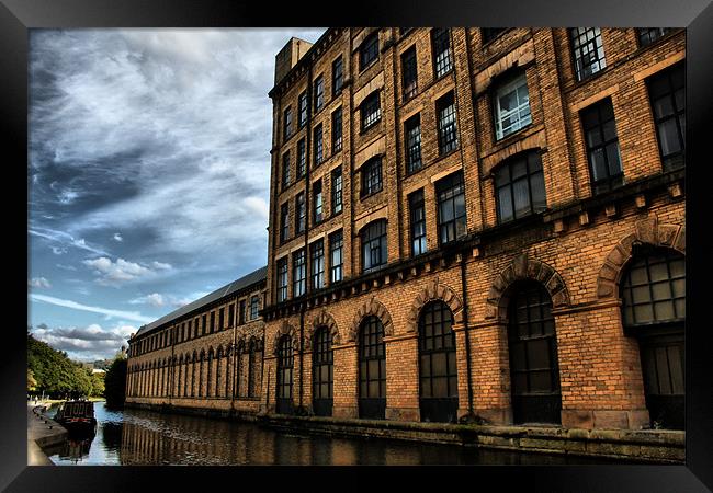 part of  salts mill over  leeds liverpool canal Framed Print by simon sugden
