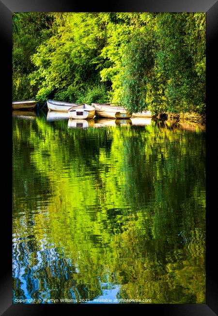 Rowing Boats On A Lake Framed Print by Martyn Williams