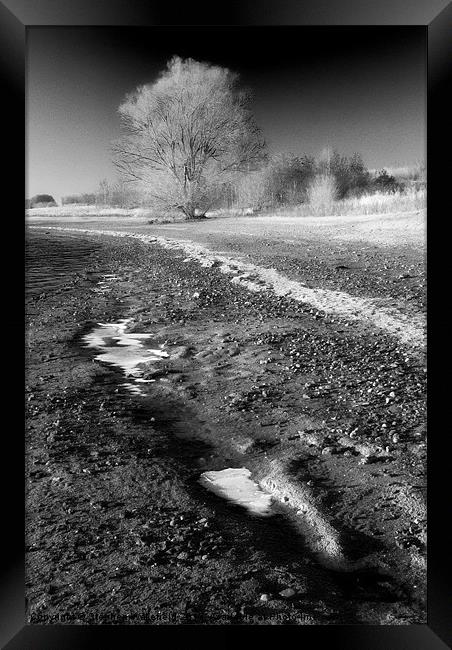 Frozen shoreline Framed Print by Stephen Wakefield