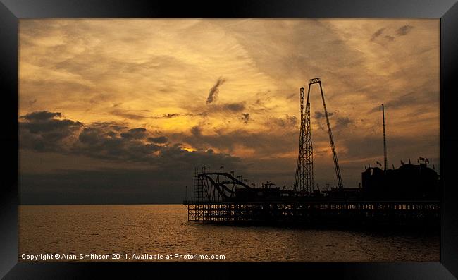 Sunset over the Pier Framed Print by Aran Smithson
