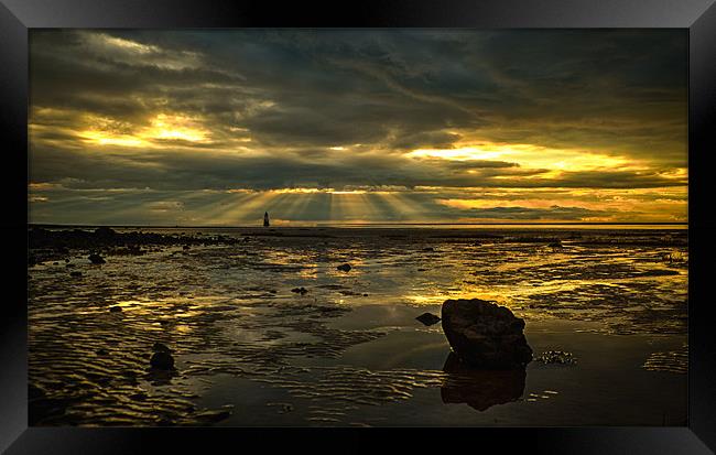 Rays, Rocks and a Lighthouse Framed Print by Aran Smithson