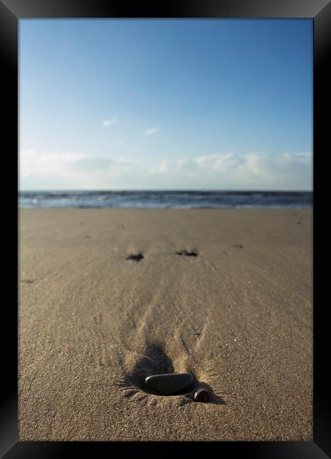 Pebbles on the beach Framed Print by Aran Smithson