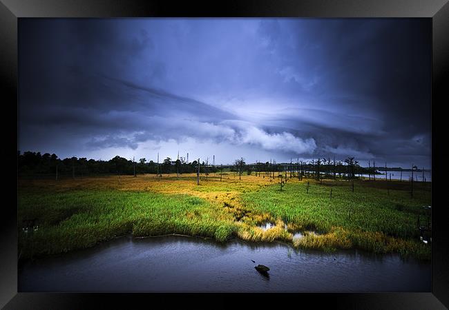 Storm over the marsh Framed Print by Kieran Brimson