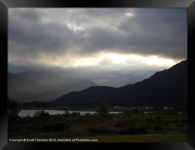 Sunlight through clouds Framed Print by Scott Thomson