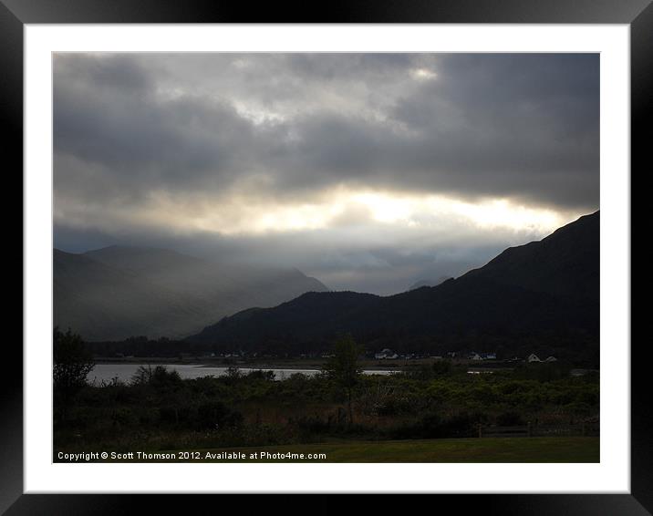 Sunlight through clouds Framed Mounted Print by Scott Thomson