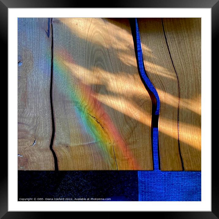 Prism patterns alight on natural wood table Framed Mounted Print by DEE- Diana Cosford