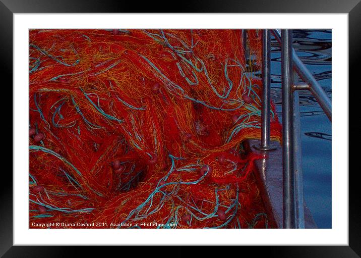 Red fishing nets over railings Framed Mounted Print by DEE- Diana Cosford