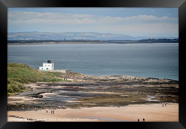 Bamburgh Lighthouse and Beach. Framed Print by Colin Metcalf