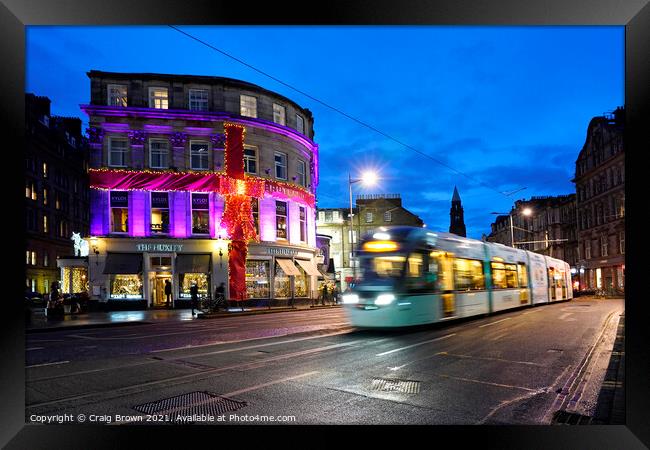 Edinburgh Tram at dusk Framed Print by Craig Brown