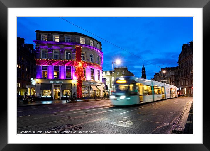Edinburgh Tram at dusk Framed Mounted Print by Craig Brown